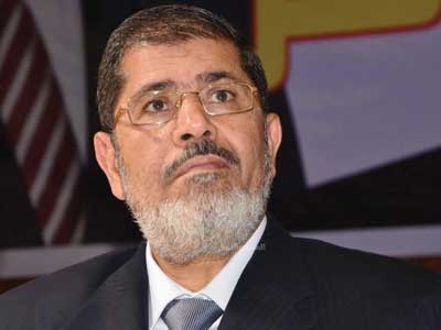 الأمن المصري نقلاً عن مرسي : السيسي لن يكمل فترته الرئاسية وأنا رئيس شرعي ومش بلطجي