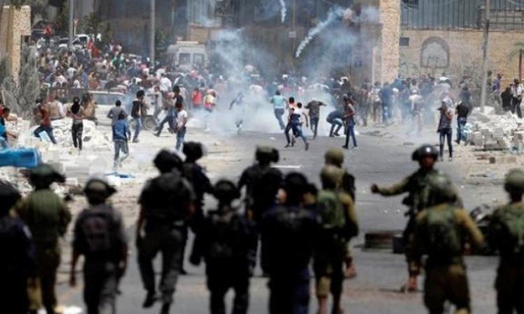 إصابة عشرات الفلسطينيين بهجوم لمستوطنين جنوب نابلس